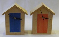 Three Beach Hut Clocks